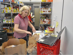 Helping bag food at Hilliard Food Pantry